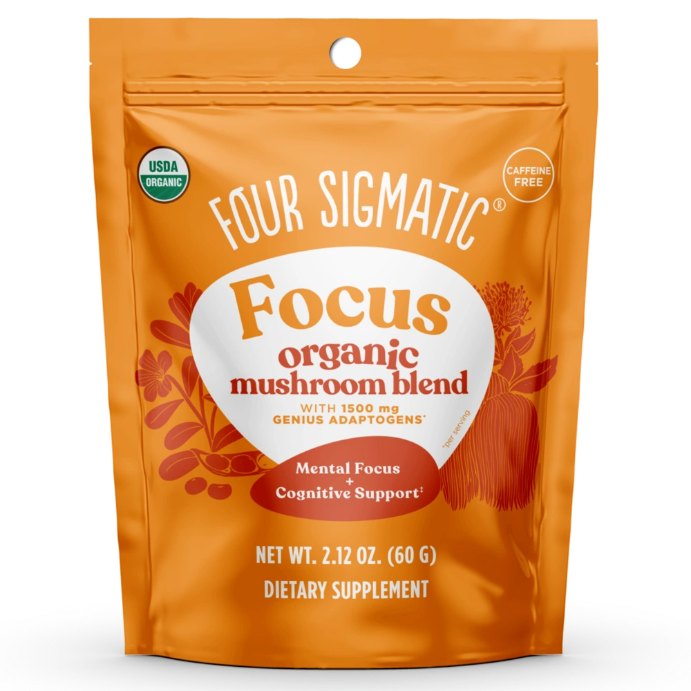 Four Sigmatic Focus Organic Mushroom Blend in a bright orange stand-up pouch with white and red text, USDA Organic seal, and caffeine-free badge.