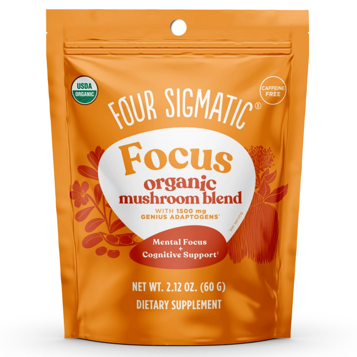 Four Sigmatic Focus Organic Mushroom Blend in a bright orange stand-up pouch with white and red text, USDA Organic seal, and caffeine-free badge.