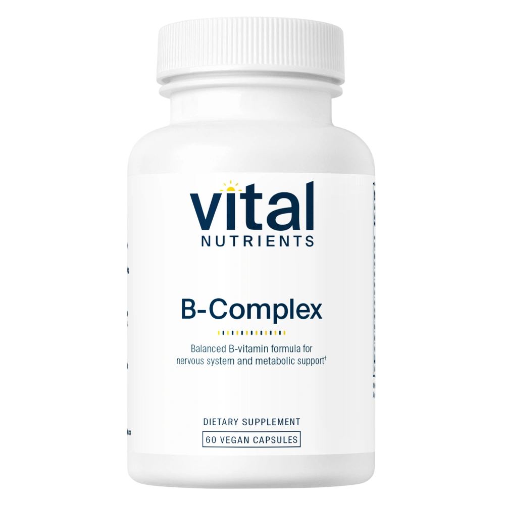 A white plastic bottle of Vital Nutrients B-Complex dietary supplement with a white ribbed cap, featuring a clean white label with navy blue text and a small yellow sun icon.