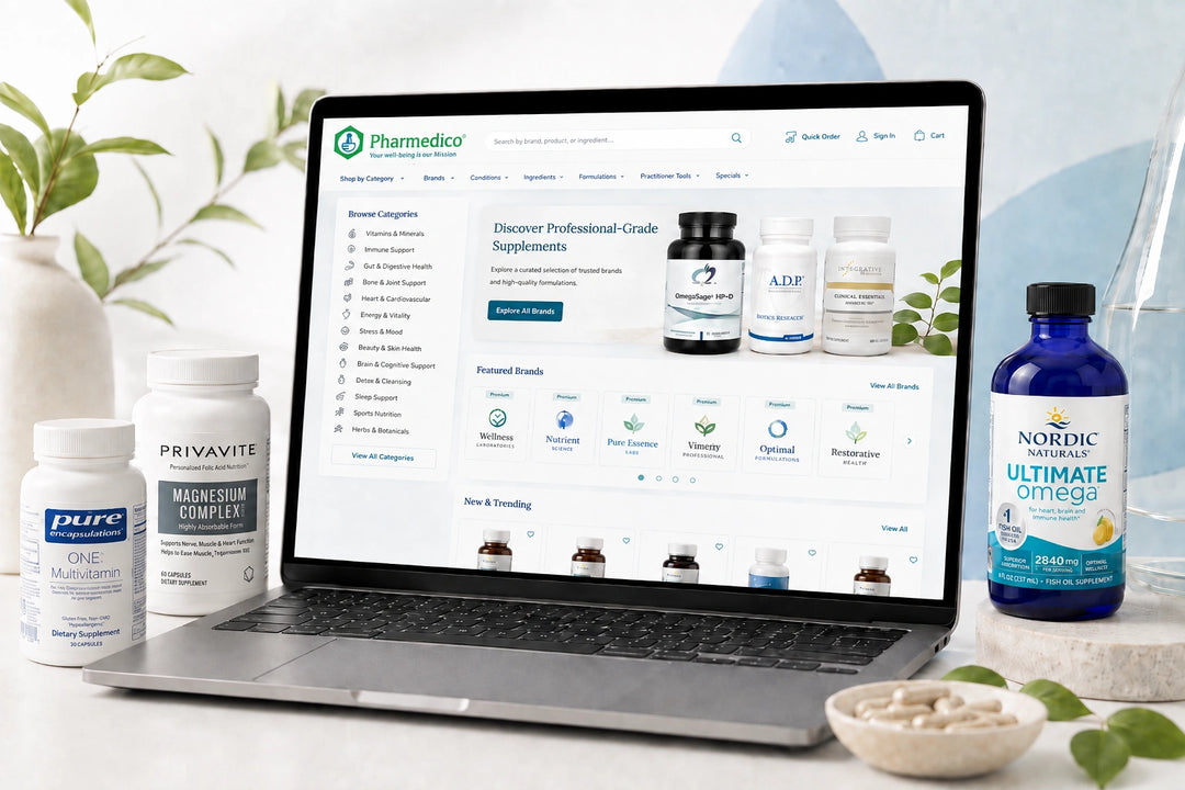 Laptop displaying Pharmedico’s online supplement store surrounded by professional-grade vitamin and supplement products.