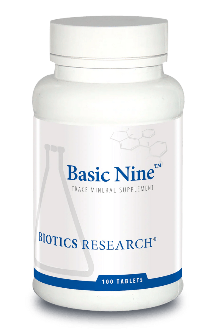 Biotics Research Basic Nine trace mineral supplement bottle featuring white packaging with blue accents, a laboratory beaker graphic, and a 100 tablets count.