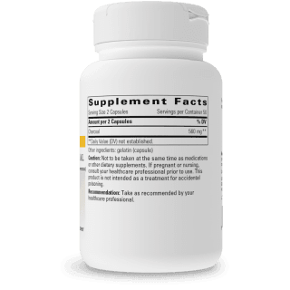 Supplement Facts panel on bottle for Integrative Therapeutics Activated Charcoal showing a serving size of 2 capsules with 50 servings per container, containing 580 mg of charcoal per serving